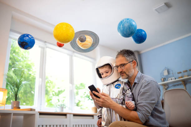 Sci-fi fan holding a POP! card with space AR experience